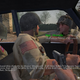 Two soldiers in a car, talking to another outside, in the original Call Of Duty.